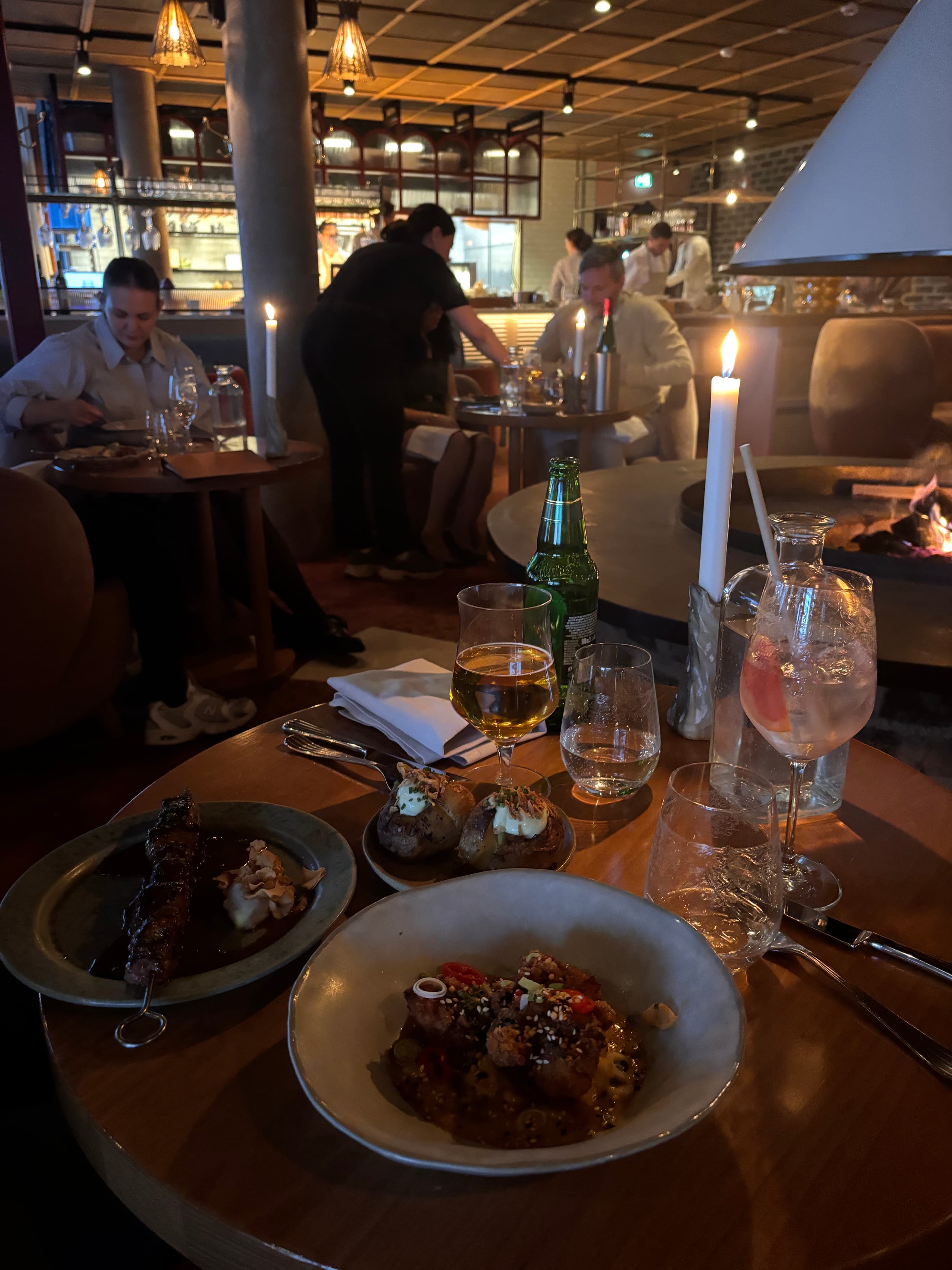 Dinner by candlelight next to the fireplace