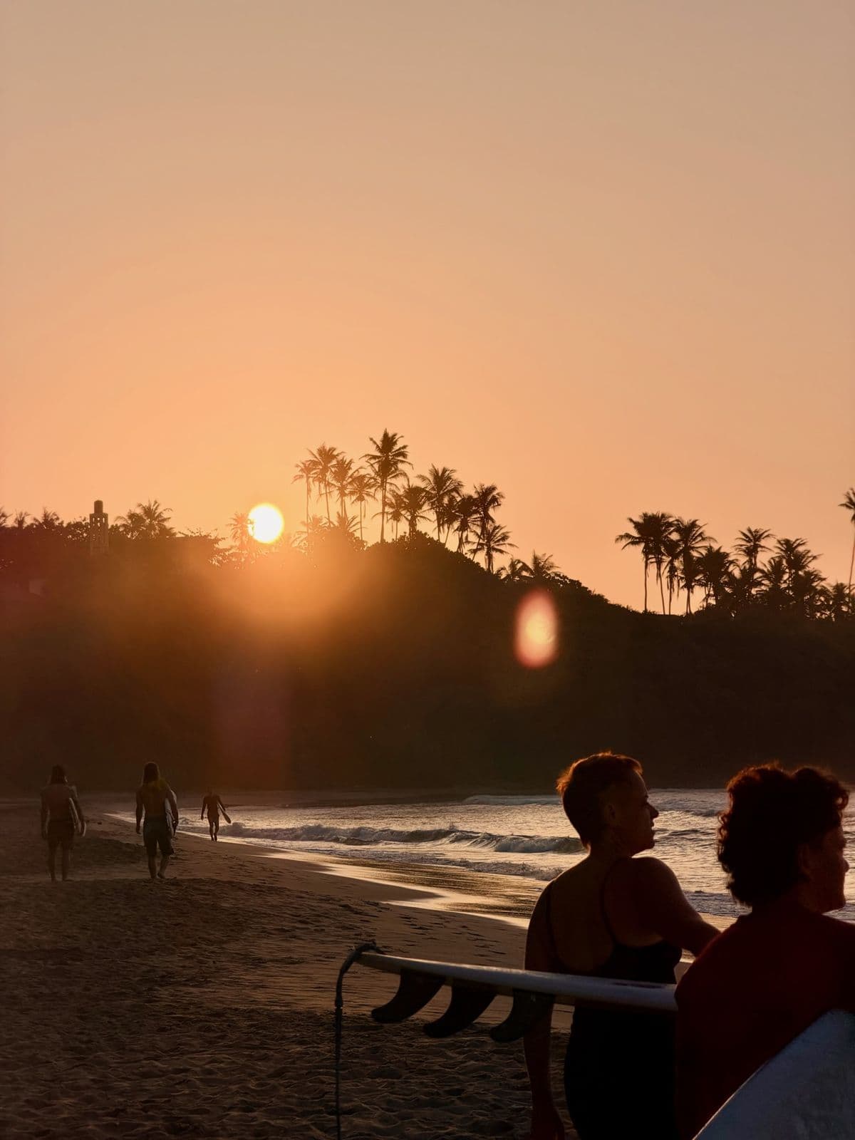 Sunset over a surf beach