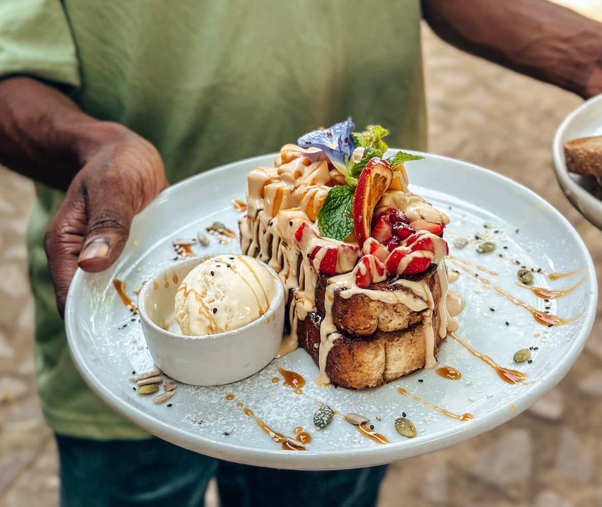 French toast with caramel, strawberries and ice cream