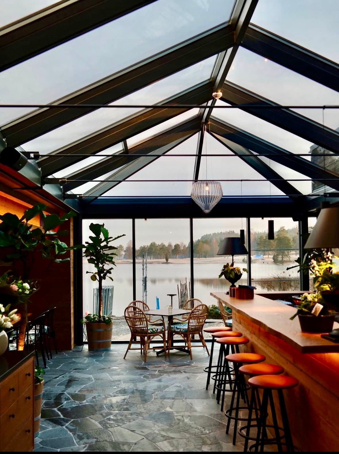 Glass-roofed bar with a view of the lake